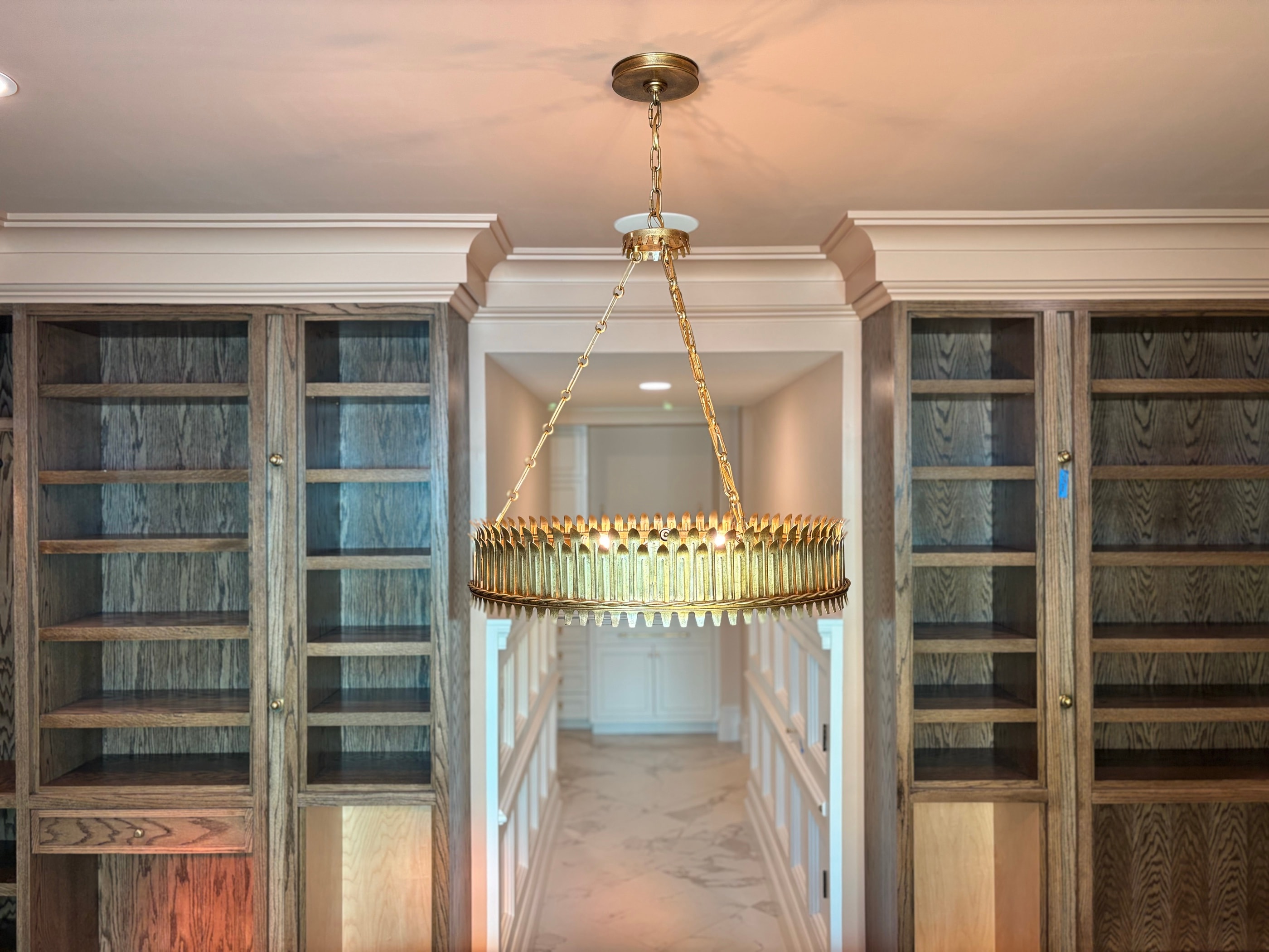 Grand home library with floor-to-ceiling built-in shelving